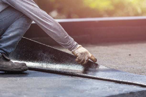 Professional Waterproofing technician working in Woodland, WA